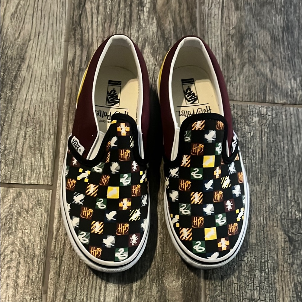 Vans Black and White Checkerboard Slip-On Sneakers